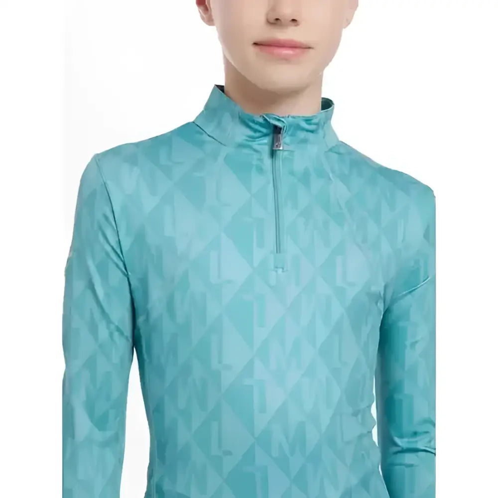 Teal lemieux young rider clea base layer with high collar zipper and subtle geometric pattern for active wear