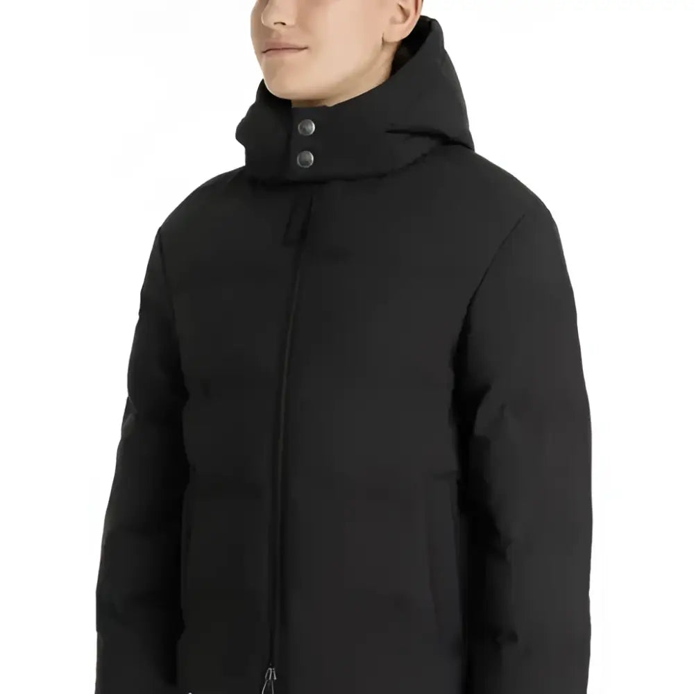 Black lemieux young rider daisy waterproof coat with hood and silver buttons in a sleek puffer design