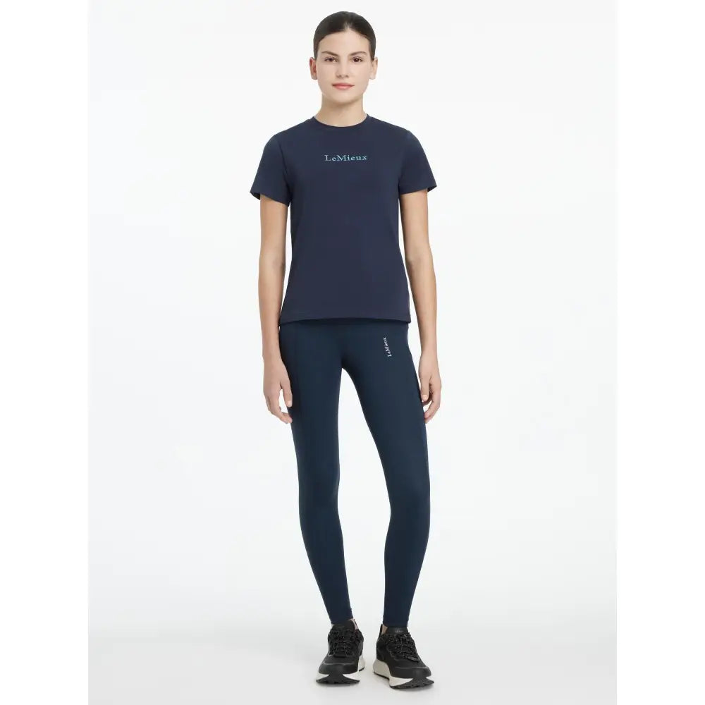 Navy blue lemieux young rider short-sleeved t-shirt with subtle white embroidery perfect for darla sport legging navy use