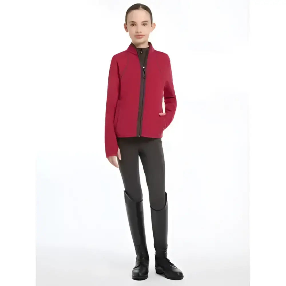 A vibrant red lemieux young rider felicity fleece zip full-zip jacket with high collar and subtle side pockets
