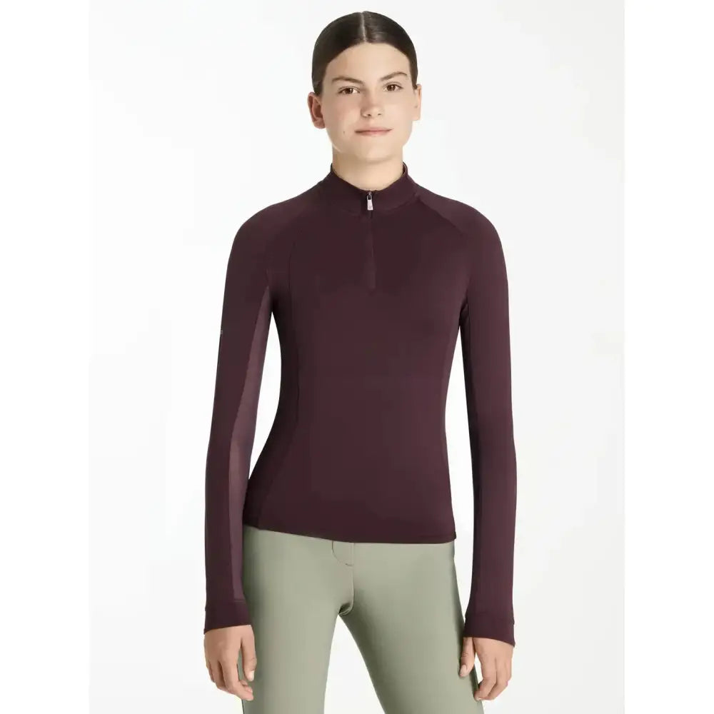 A maroon lemieux young rider hope lightweight base layer with high collar mesh panels and quarter-zip closure