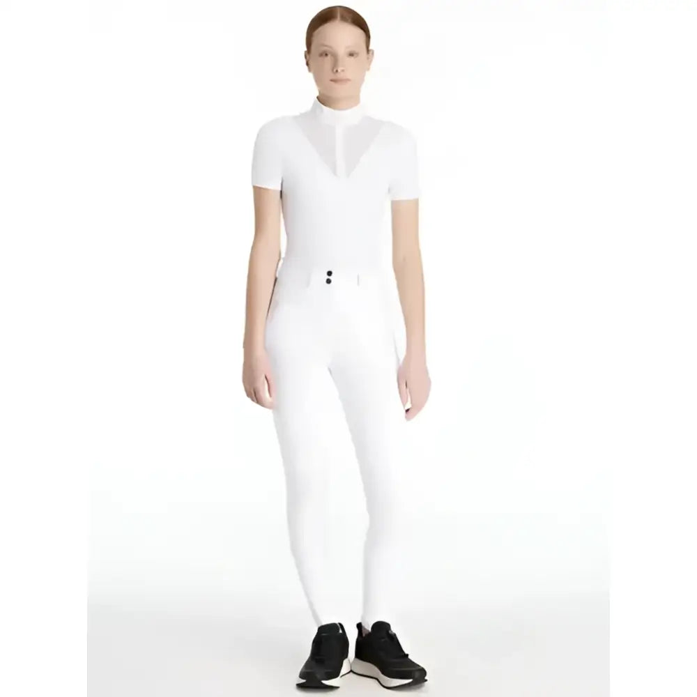 White lemieux young rider izzy knee grip breeches with short sleeve high collar top featuring mesh panel