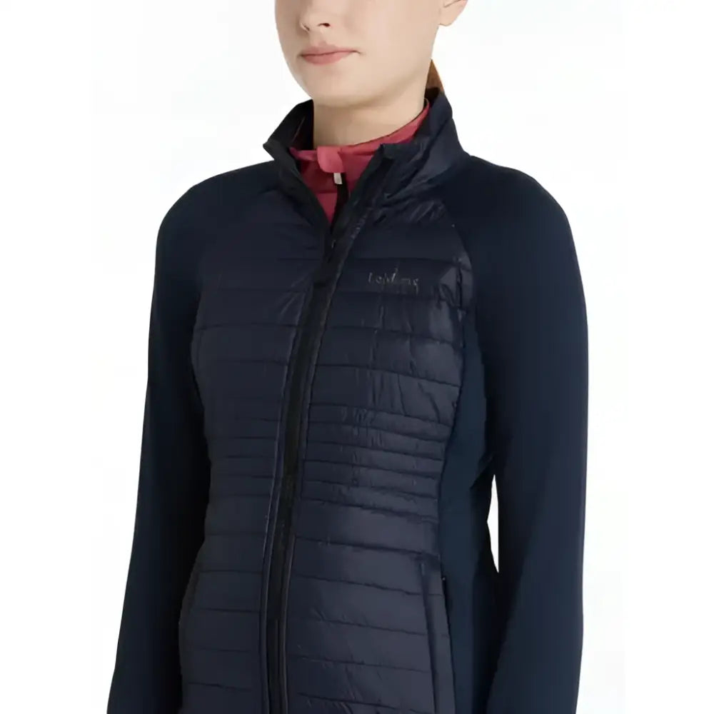 Dark navy quilted puffer lemieux young rider josephine jacket with high collar and zipper front for winter riding