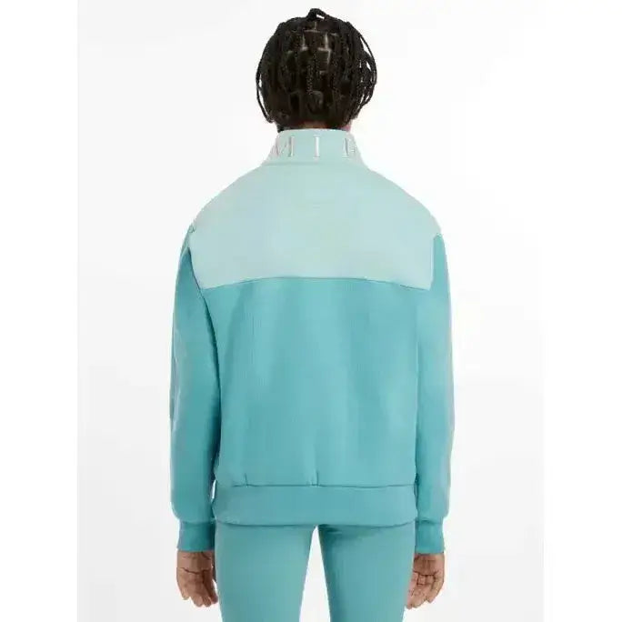 Two-tone teal and light blue lemieux young rider kate quarter zip zip sweat lagoon track jacket with high collar