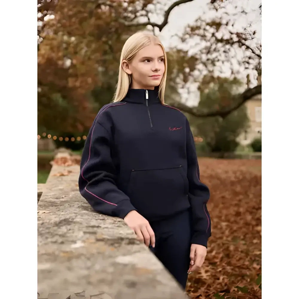 Navy blue lemieux young rider kate quarter zip sweatshirt with pink piping and small chest logo perfect for riding