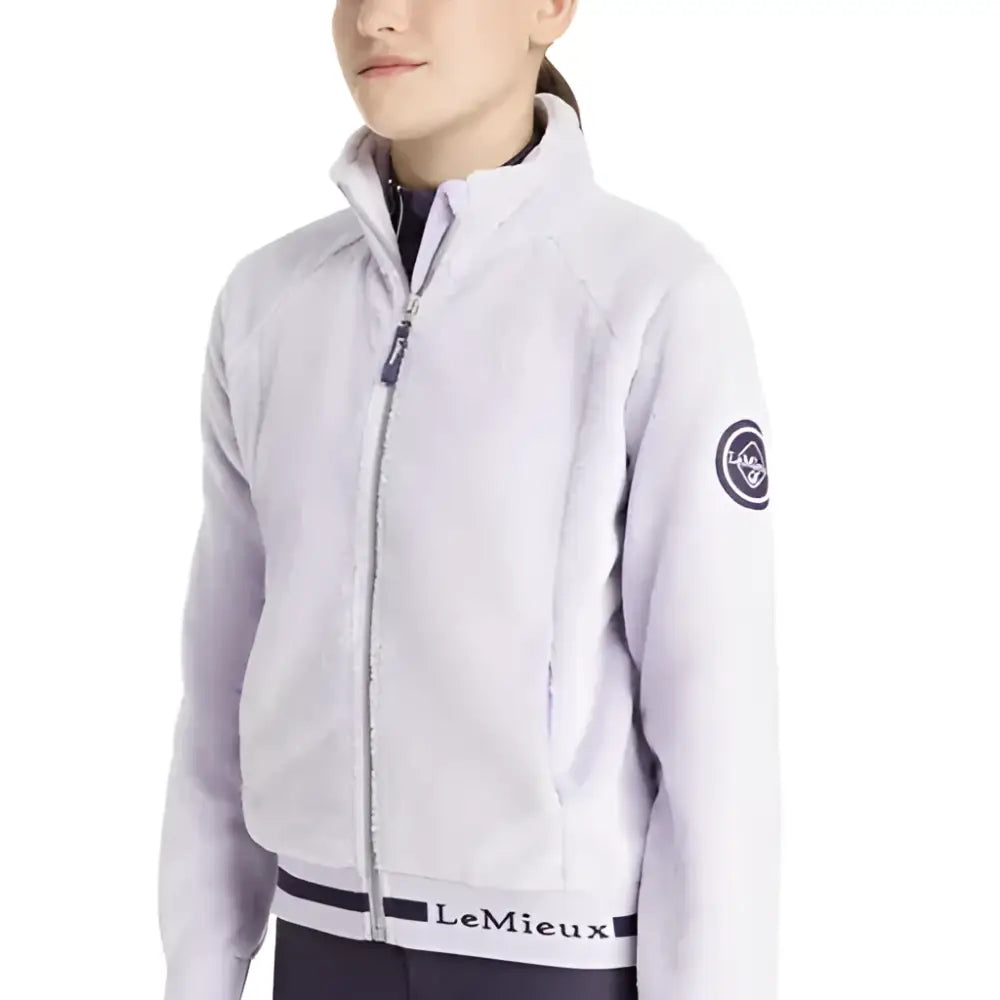 Light gray lemieux young rider libby fleece lilac jacket with black zipper trim and logo on left sleeve