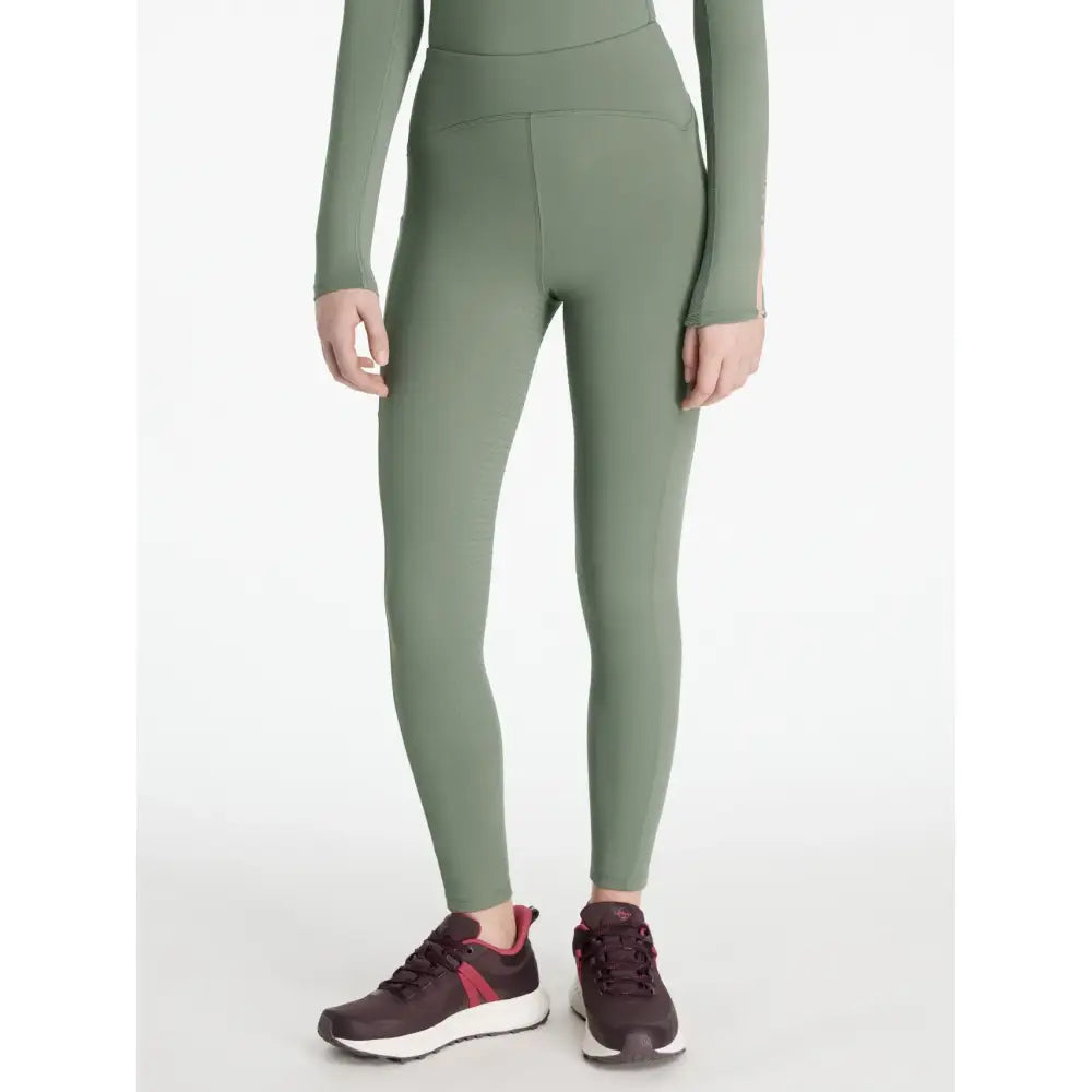 Olive green lemieux young rider nell brushed pull high-waisted leggings with sleek fit and subtle side seam detailing