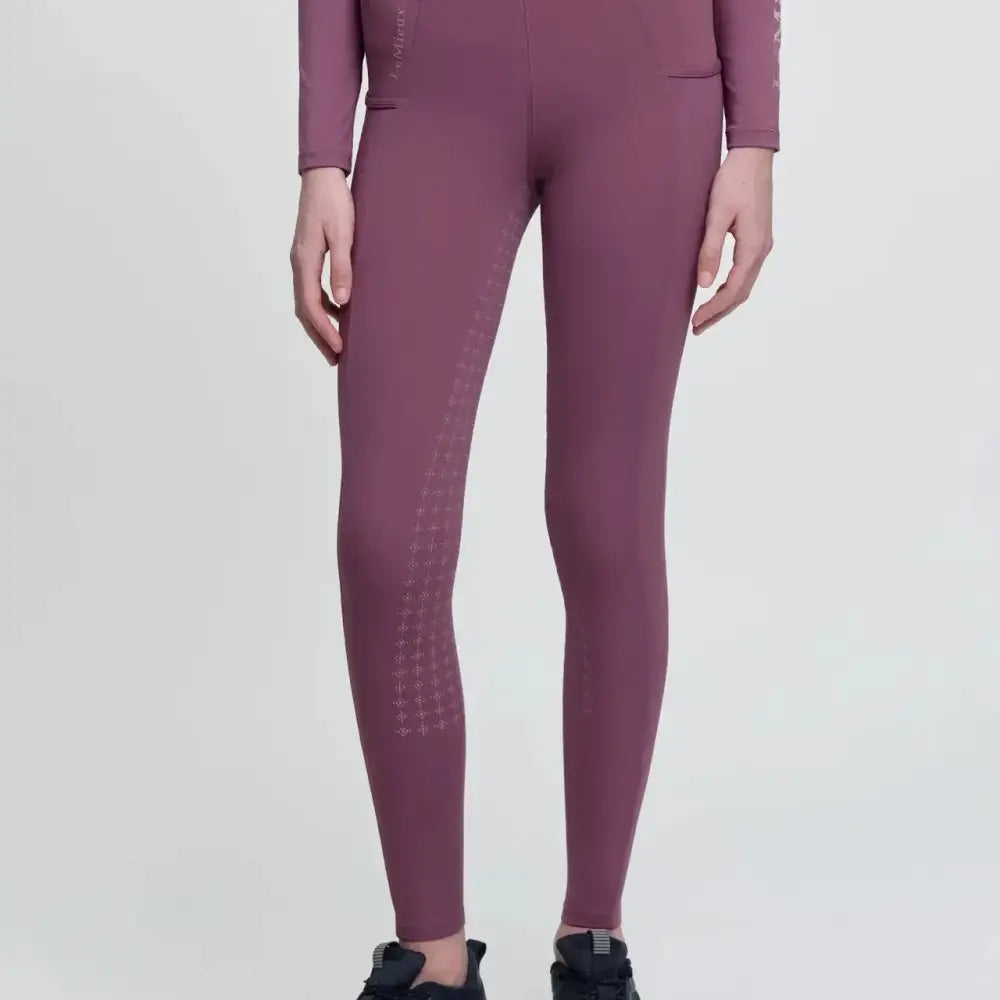 Purple lemieux young rider breech mallow leggings with subtle white dot detailing for active riders