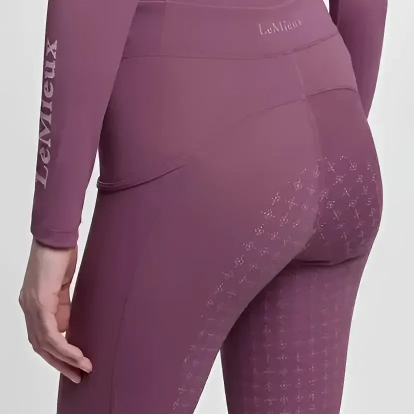 Purple lemieux young rider breech mallow leggings with subtle crosshatch pattern and branding for active riders