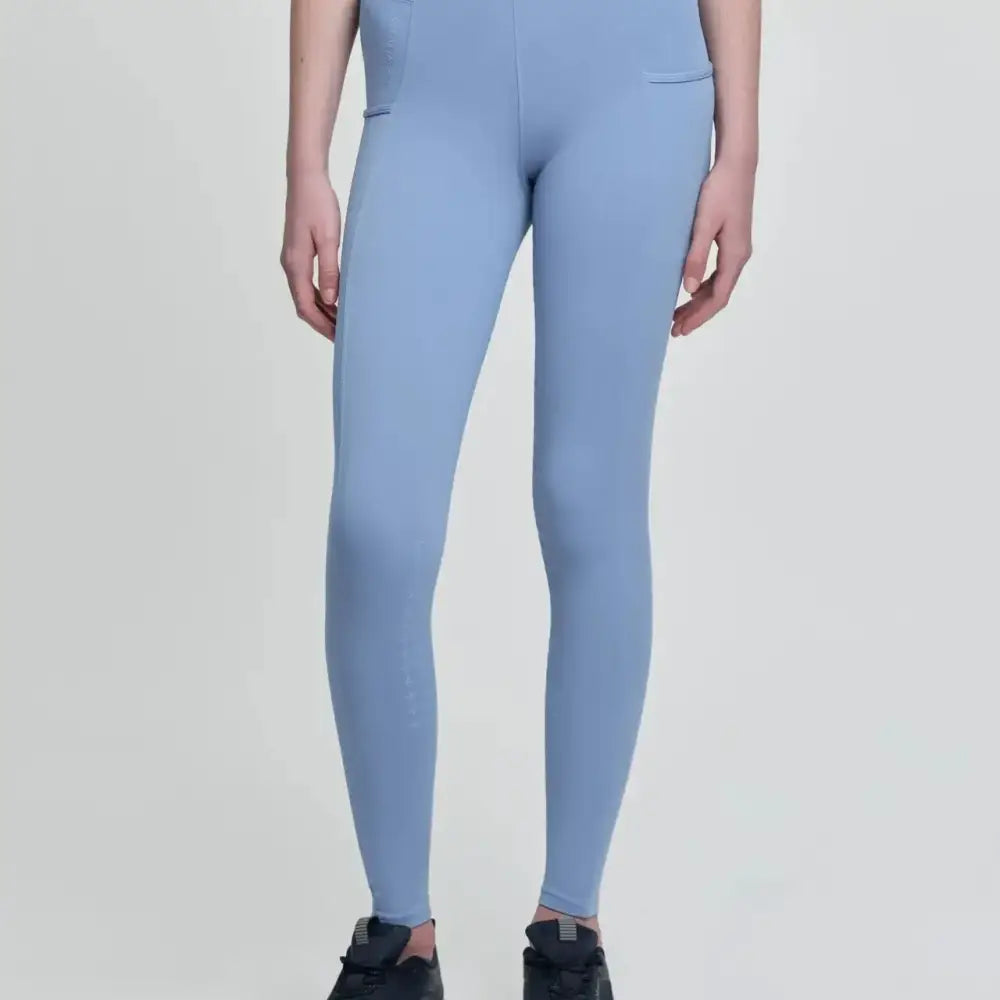 Light blue lemieux young rider orla pull high waisted breech powder blue leggings with side pockets for riding
