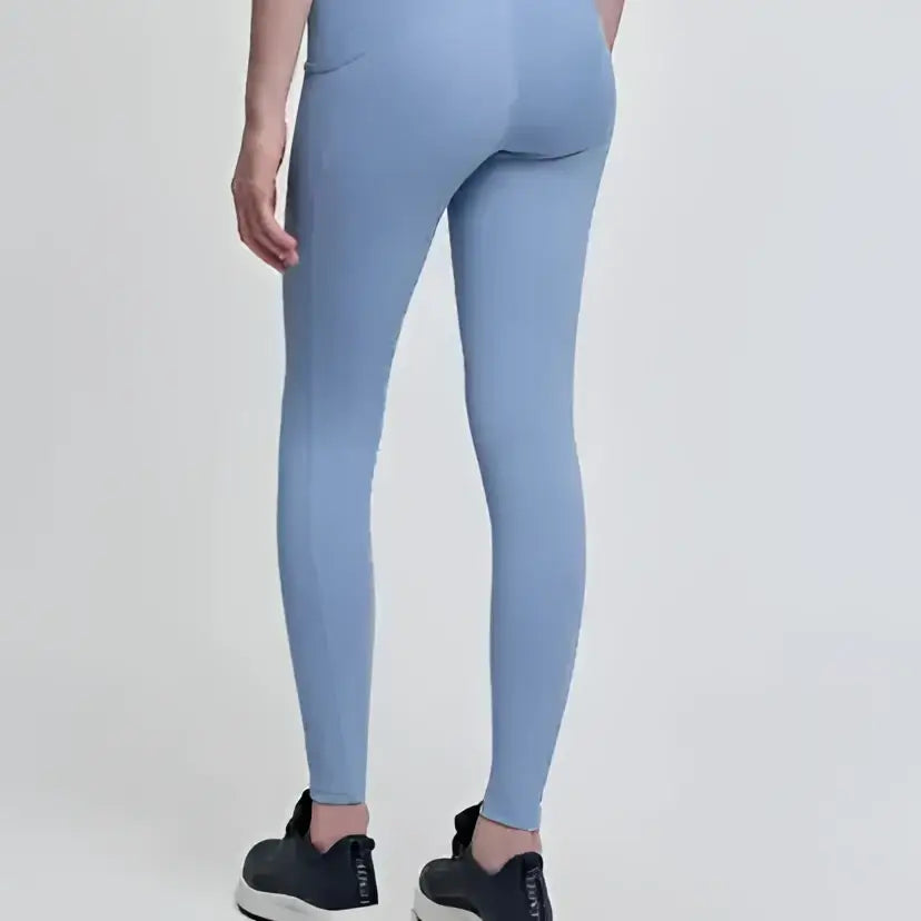 Light blue lemieux young rider orla pull breech powder blue with smooth stretchy fabric and subtle side seam detailing