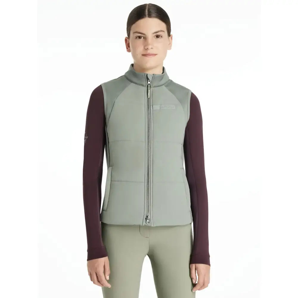 Women’s lemieux young rider pammy training gilet in two-tone muted sage green and deep burgundy with high collar