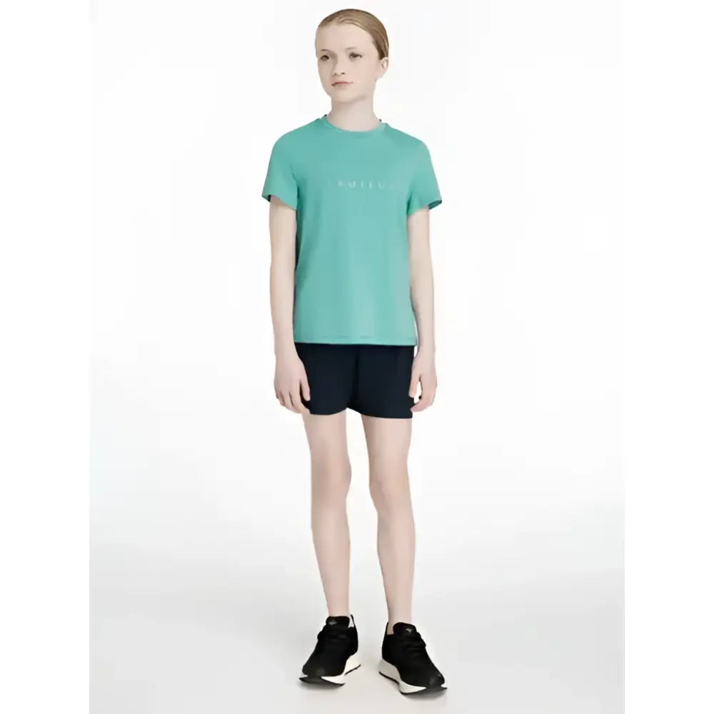 A teal short-sleeved t-shirt with a subtle white logo paired with lemieux young rider penelope shorts navy