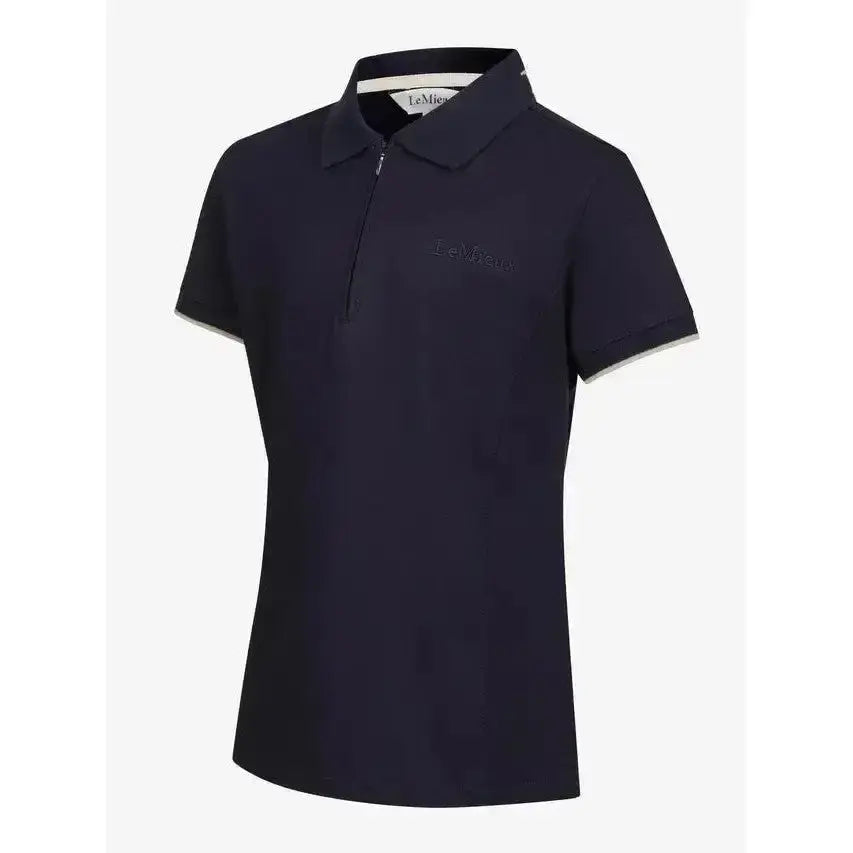 Dark navy lemieux young rider polo shirt with subtle embroidery and white trim on collar and sleeve cuffs