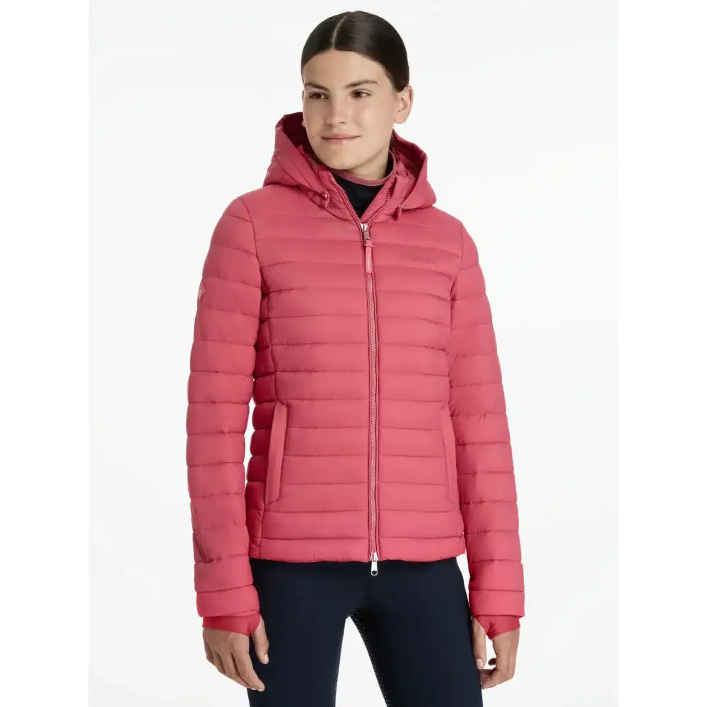 A vibrant pink quilted hooded puffer jacket with zipper and pockets lemieux young rider ruby puffer jacket