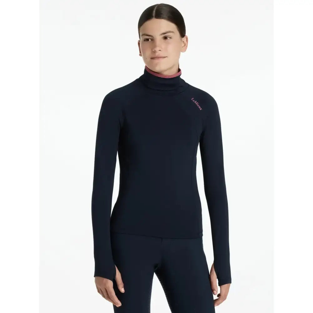 Navy blue lemieux young rider savannah snood base layer with long sleeves pink inner collar and logo on chest