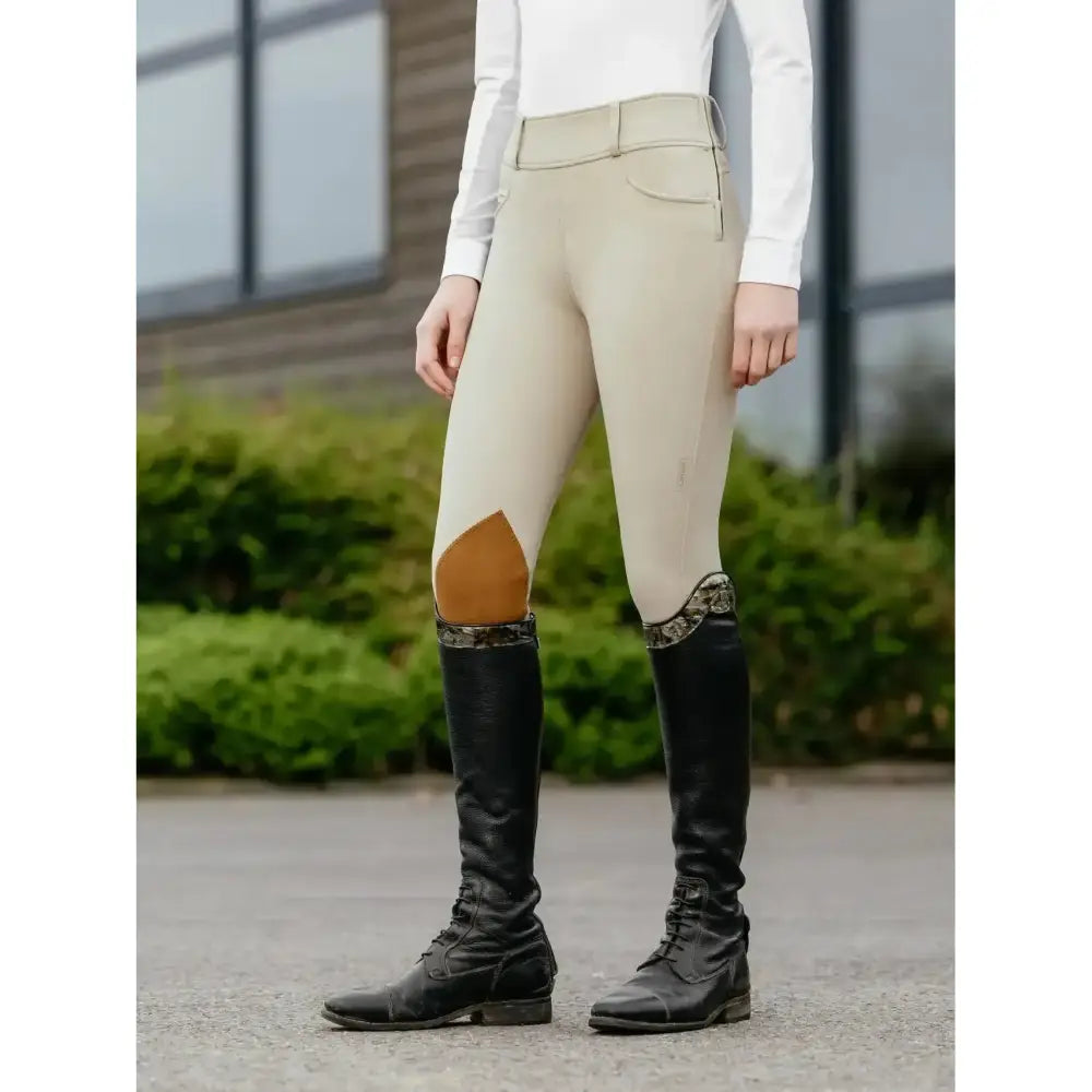 Beige lemieux young rider zip hunter breeches with tan knee patches and lace trim at the cuffs