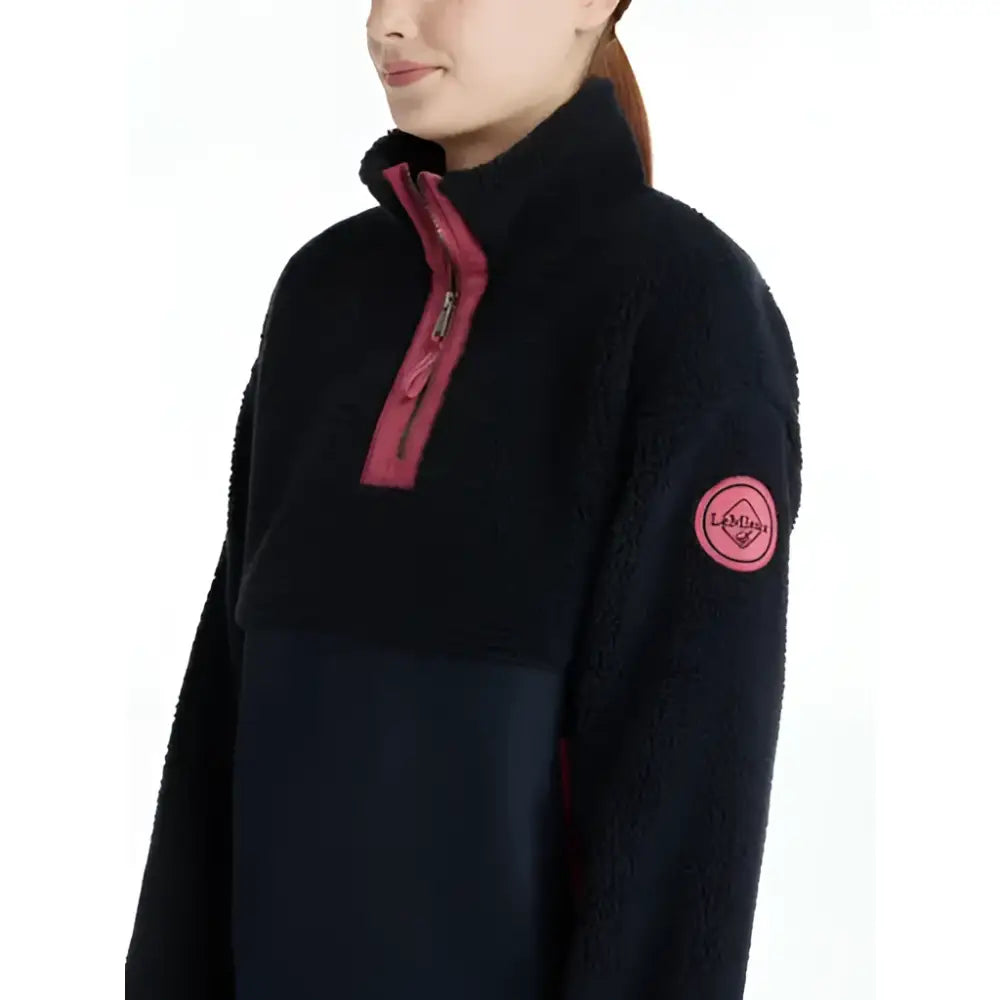Black lemieux young rider tammy teddy fleece navy half-zip jacket with pink zipper and matching logo patch on sleeve