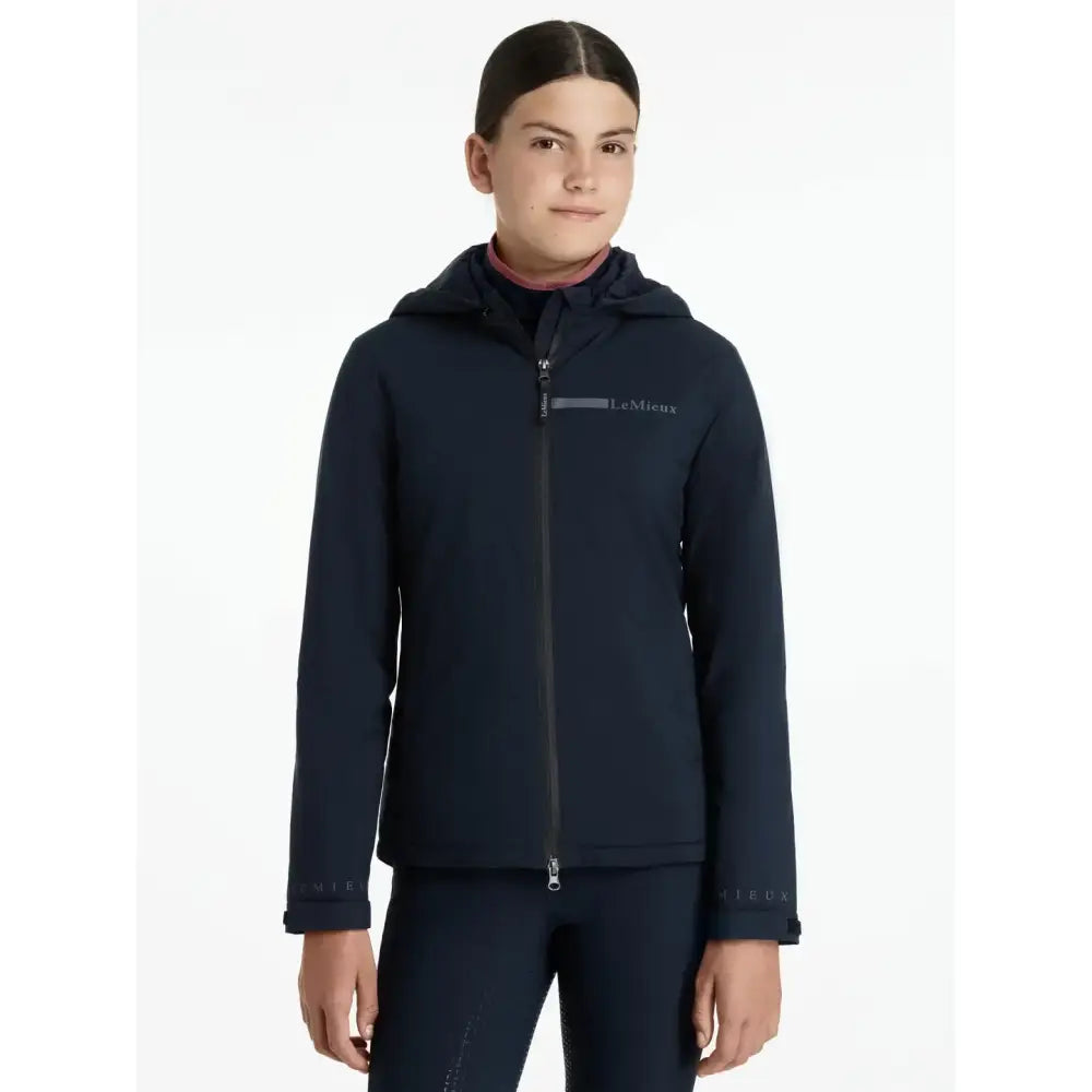 Navy blue lemieux young rider thea water resistant jacket with hood full zipper and subtle chest logo