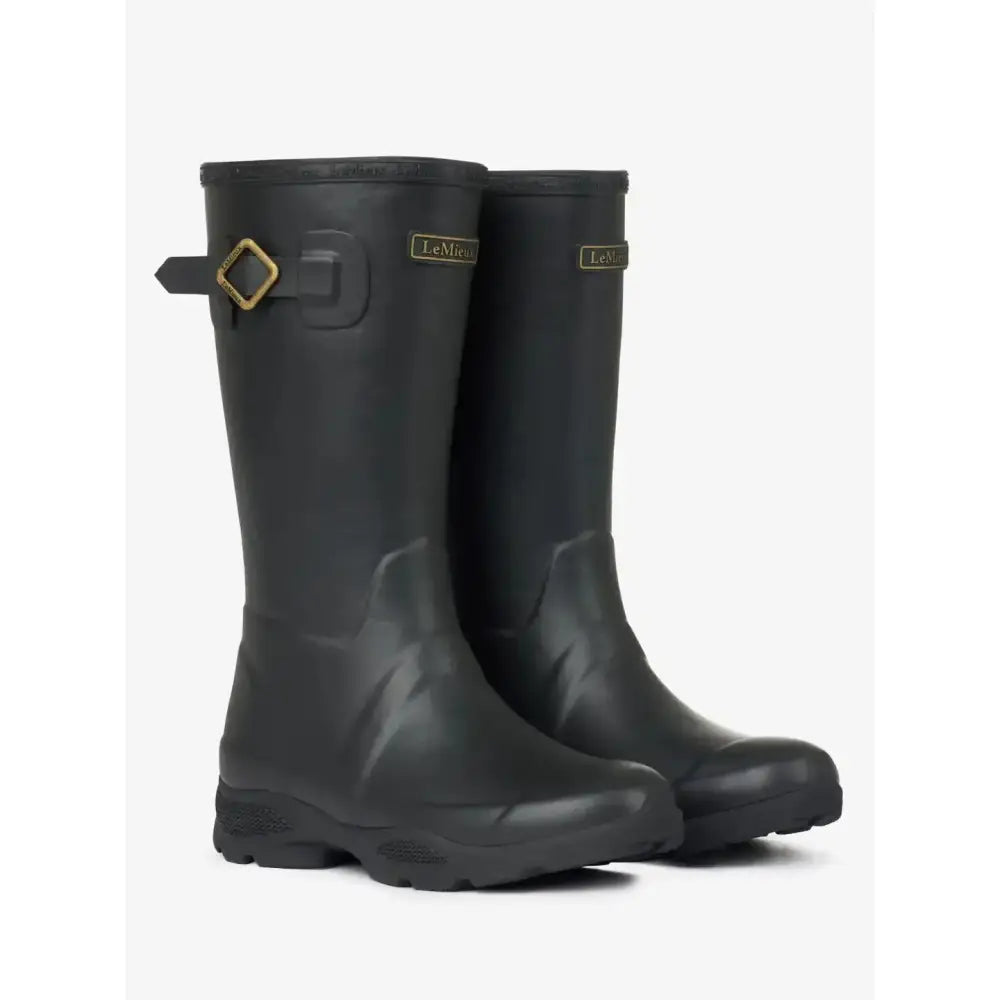 Black lemieux young rider wellies black with a gold buckle and subtle camouflage pattern featuring custom tread shape