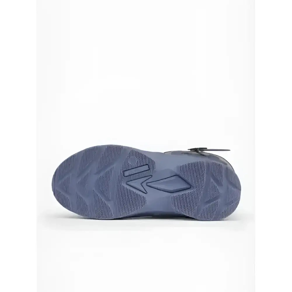 Blue rubber sole with textured pattern and embossed logo on the back of lemieux young rider wellies jay blue