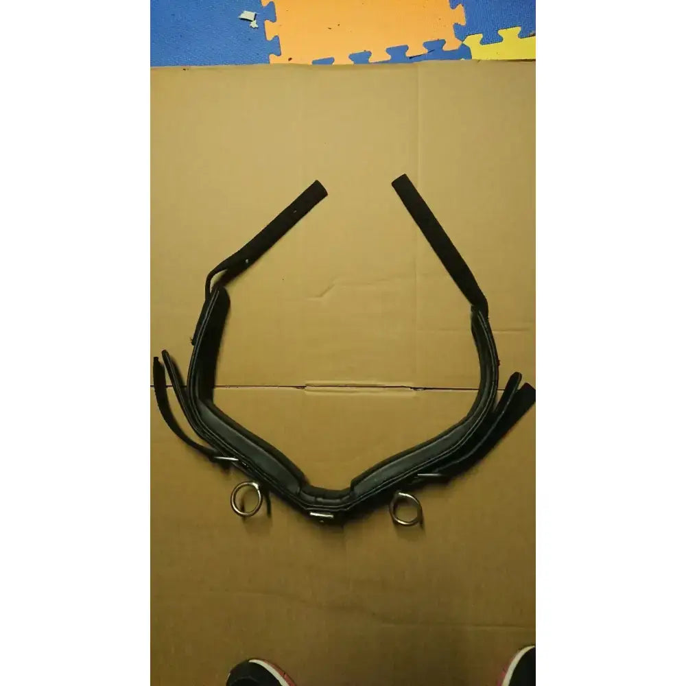 Black leather horse halter with adjustable straps and metal rings for libbys driving saddle harness parts including webbing tugs