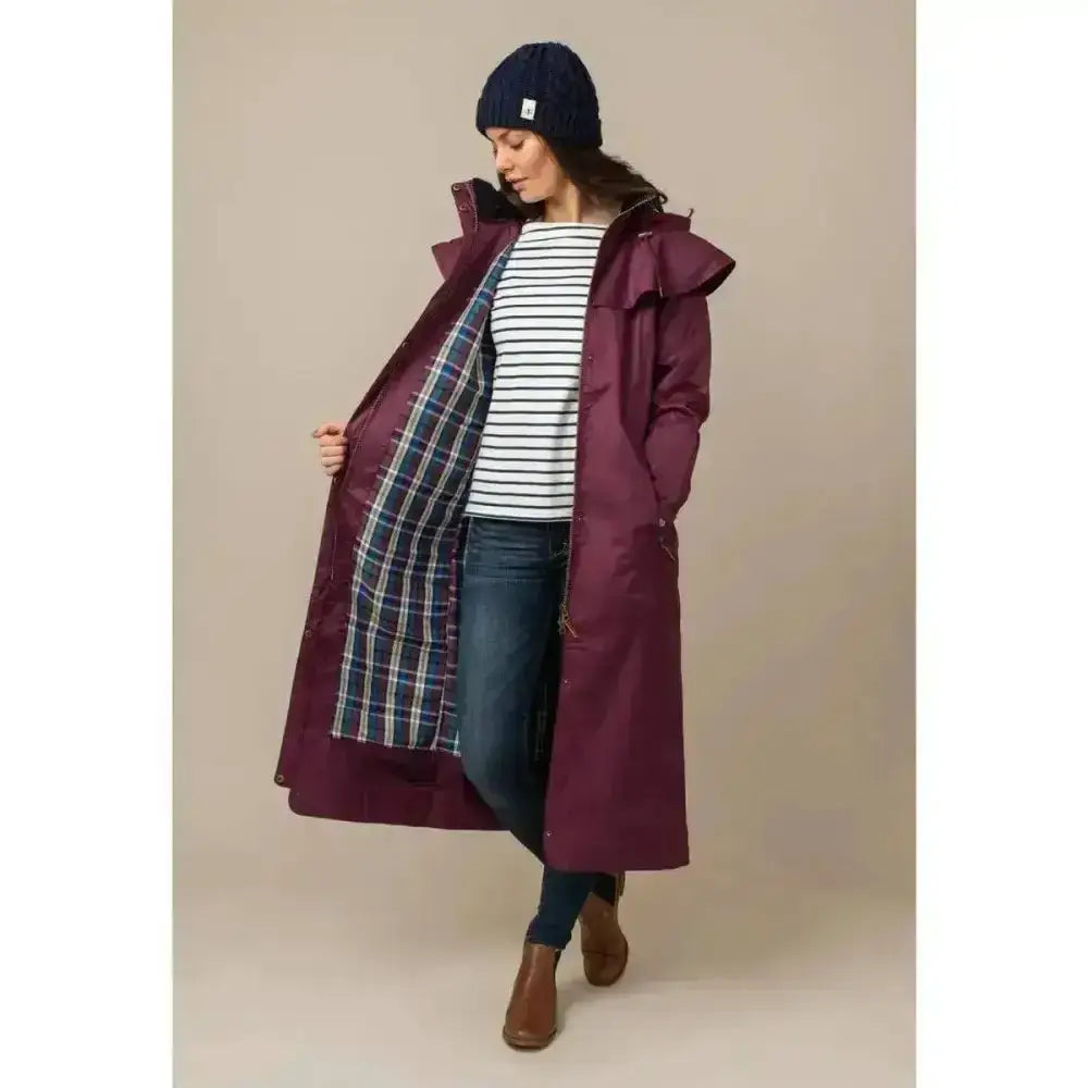 Maroon lighthouse outback ladies full length waterproof raincoat with plaid lining hood and adjustable leg straps
