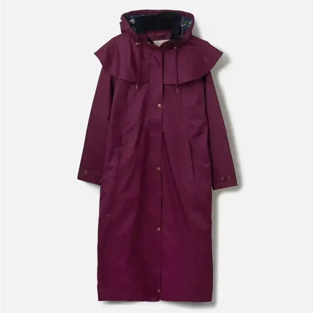 A maroon lighthouse outback ladies full length waterproof raincoat with ruffled hood button closures and adjustable leg straps