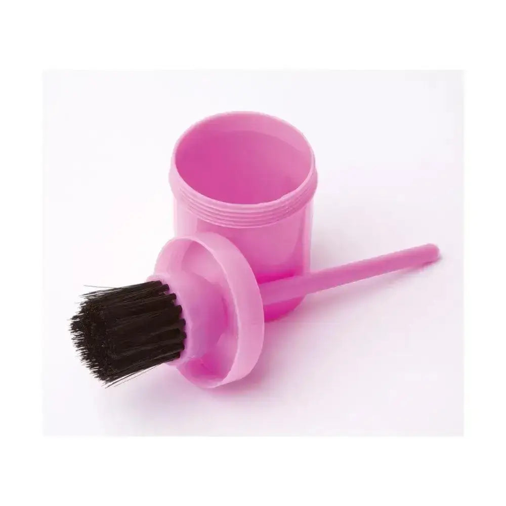 Pink plastic lincoln hoof oil brush with black bristles and matching container for easy hoof oil application