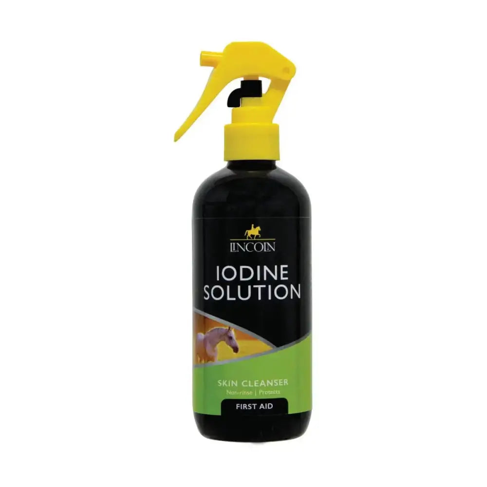 Black plastic spray bottle with yellow nozzle labeled lincoln iodine solution for general purpose skin cleanser and horse care