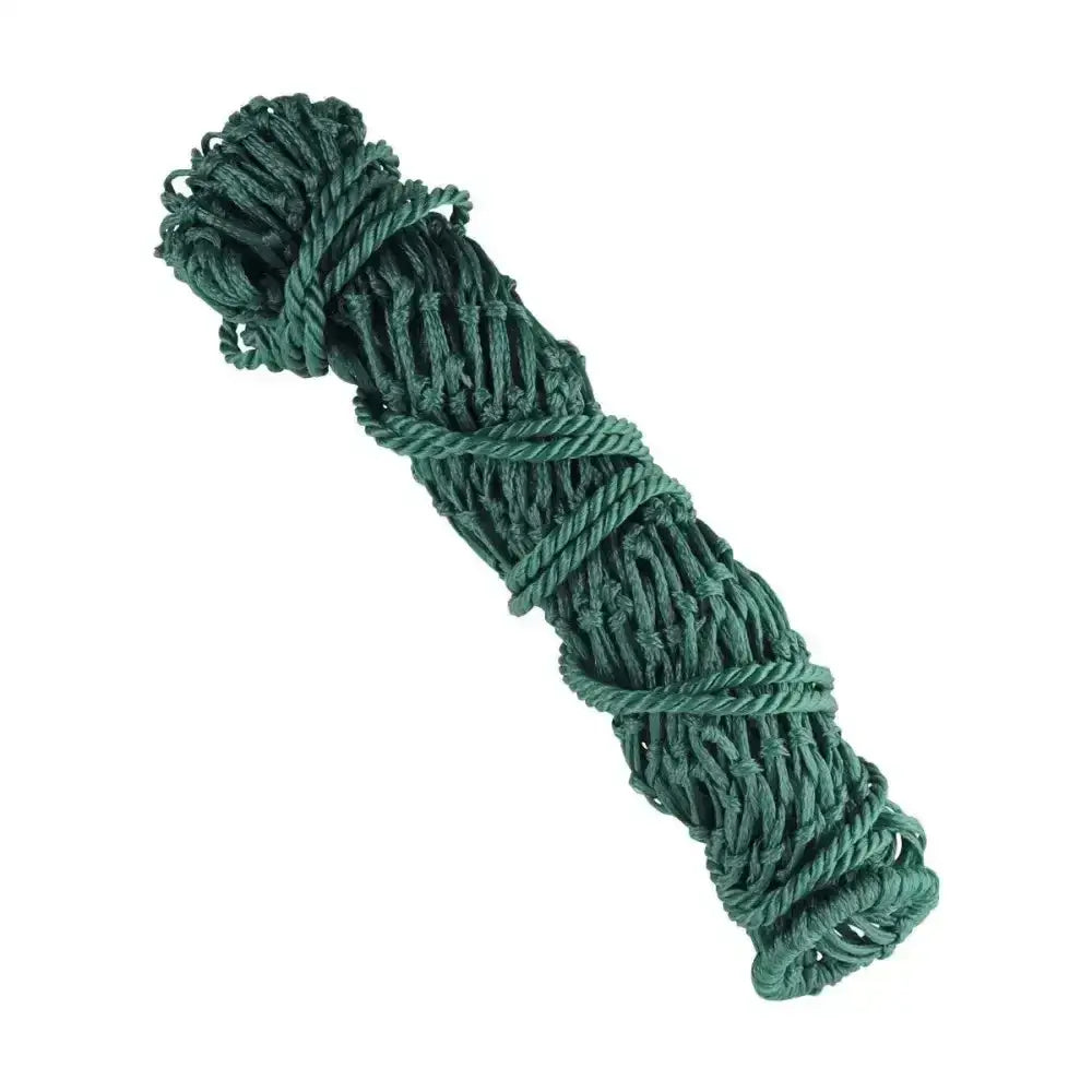 A tightly coiled dark green lincoln small mesh hay net made of small mesh polypropylene with matching ropes