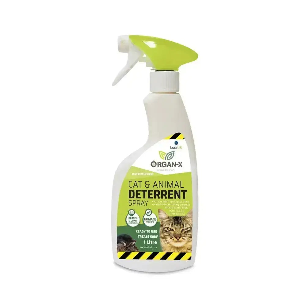 A white plastic spray bottle with lime green trigger and label of lodi organ-x cat vertebrate repellent with aluminium ammonium sulphate