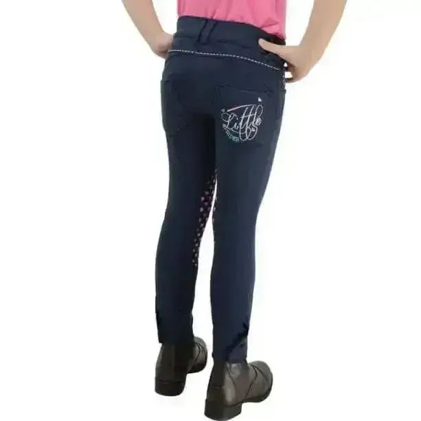 Navy blue lola love heart children’s jodhpurs with white embroidered logo perforated side panels and silicon heart print