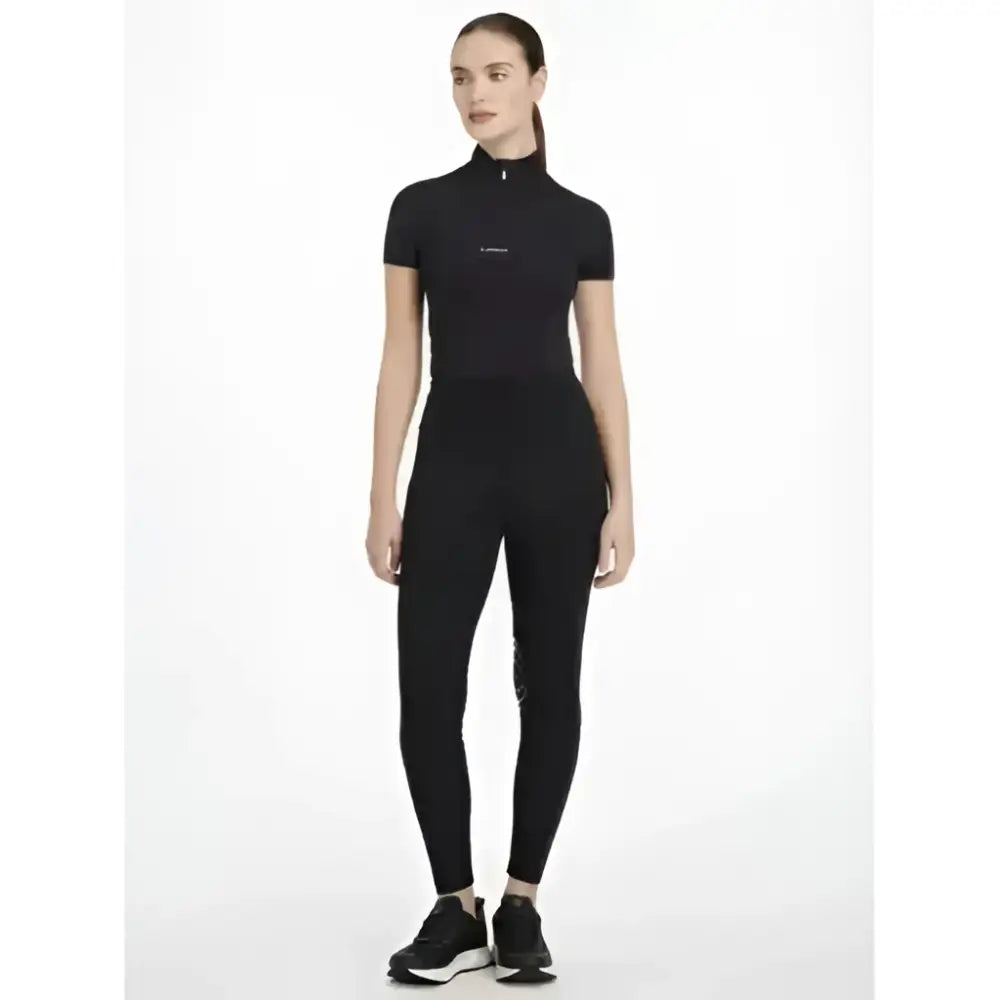 Black high neck short sleeve athletic top with subtle chest logo paired with lydia mesh leggings black