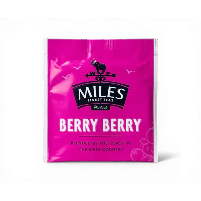 A vibrant pink berry envelope teabag packet from miles tea labeled berry berry for coffee berry lovers