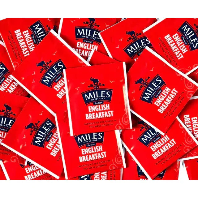 Red rectangular english breakfast envelope teabags from miles tea with kenya tea leaves and elephant logo