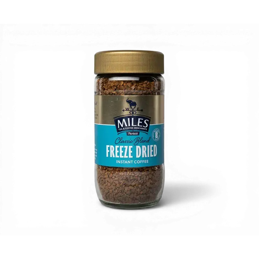 Miles tea freeze dried instant coffee in a clear glass jar with gold lid perfect for hot chocolate or coffee lovers