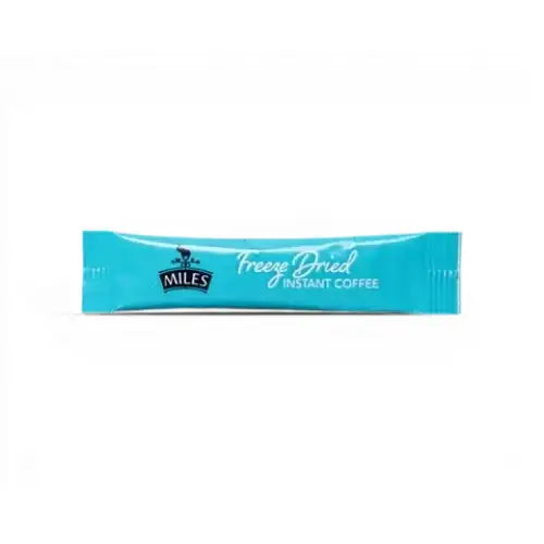 A turquoise single-serve packet of miles tea freeze dried instant coffee for quick hot chocolate or coffee fixes