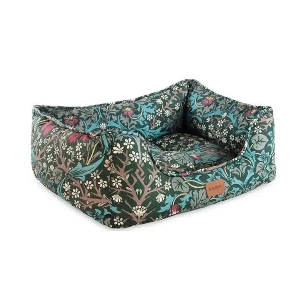 A plush rectangular pet bed in dark green fabric with intricate teal pink and white blossoms blackthorn print square bed