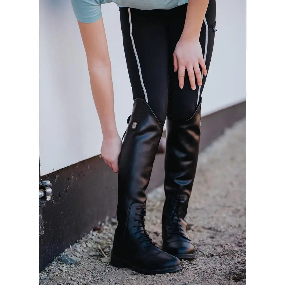 Black leather mountain horse veganza junior tall riding boots with lace-up fronts and sleek glossy finish