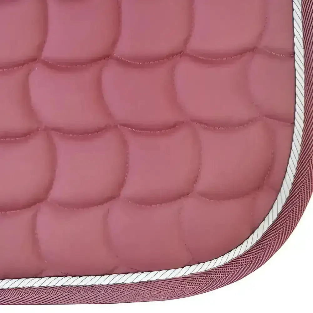 Pink quilted new gallop dressage saddle pad with contoured spine and white braided trim for anti-rub girth pad use