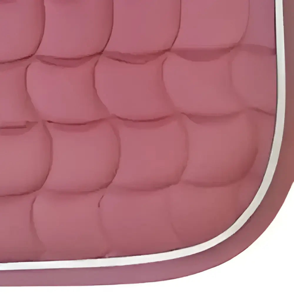 Pink new gallop quilted close contact saddle pad with white border and contoured spine for comfy rides
