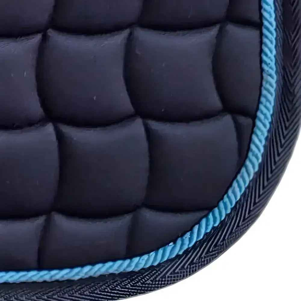 Dark blue new gallop quilted close contact gp pad with turquoise rope trim and contoured spine design