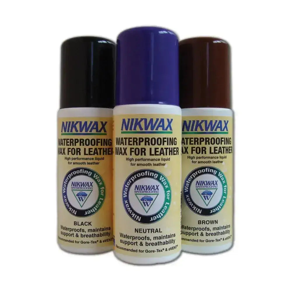 Three nikwax waterproofing wax spray cans in black neutral and brown for high performance leather care