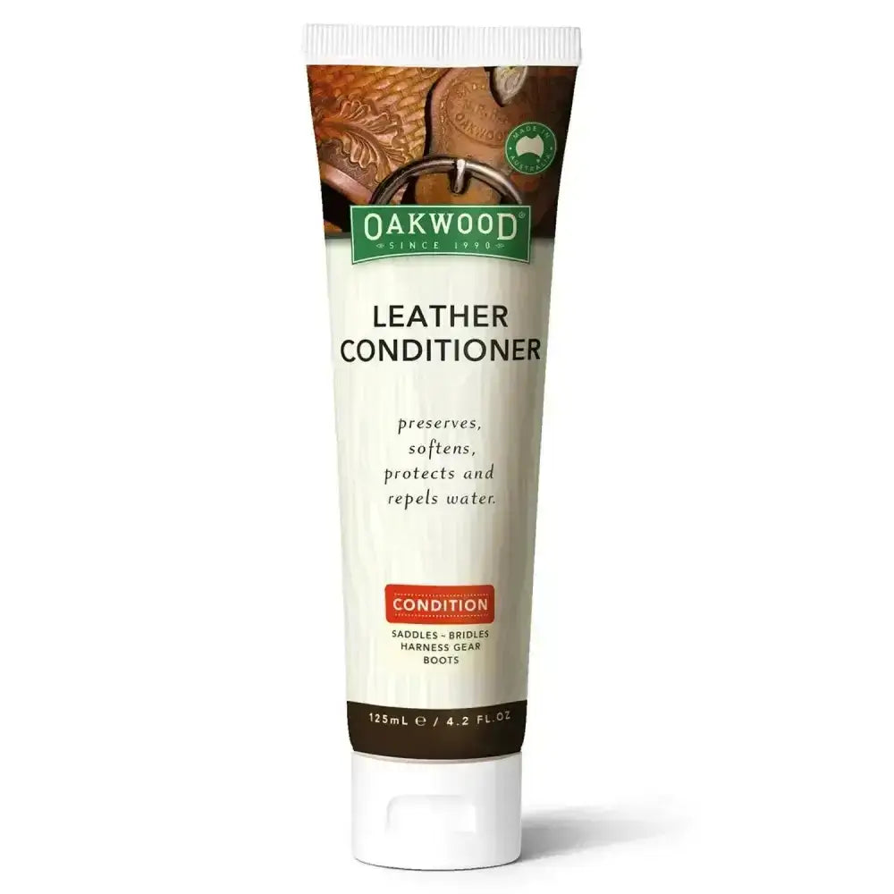 White tube of oakwood leather conditioner 125ml with brown and green label showing images of leather goods