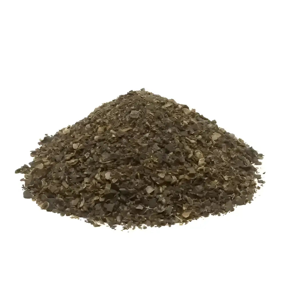 A mound of dark brown coarse-ground pepper flakes in omega equine seaweed natural nutrients seaweed supplement