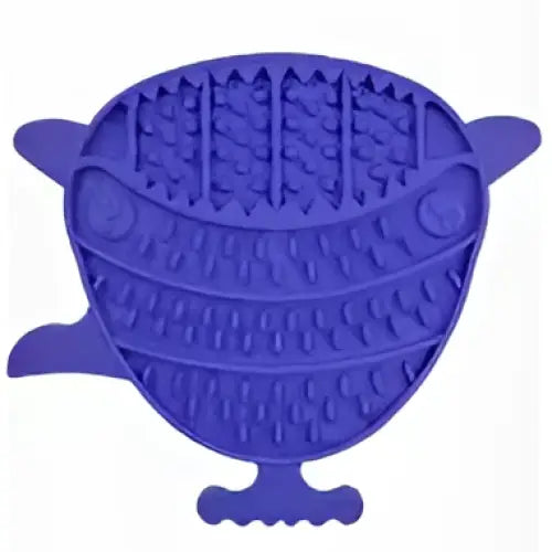 Purple silicone orva puffer fish lick mat shaped like a whale with textured ridges for dog grooming and puffer fish lick