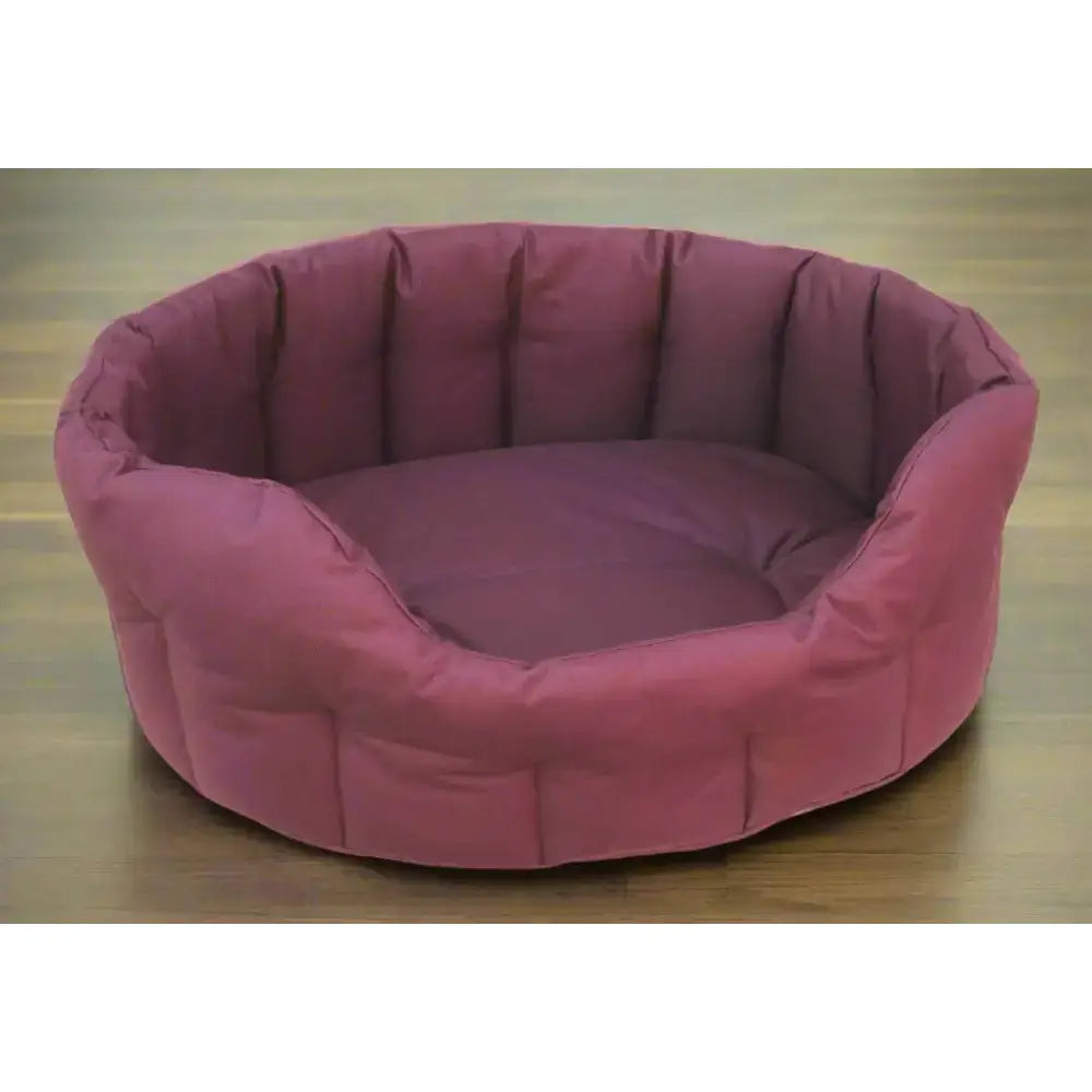 Pink quilted heavy duty oval waterproof dog bed by p&l country dog tough with soft cushioned interior and padded edges