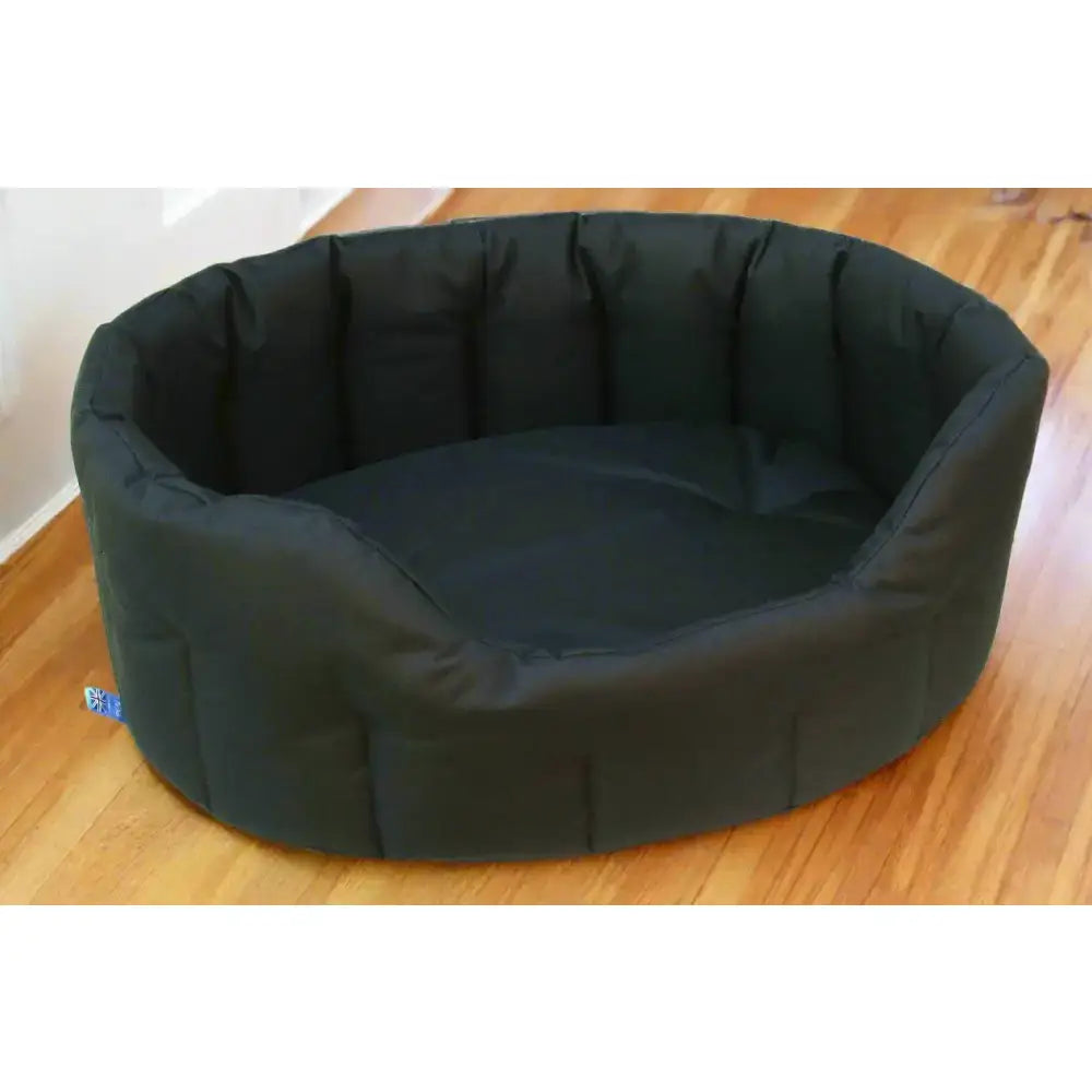 Black plush country dog tough heavy duty oval waterproof dog bed with soft cushioned interior and quilted exterior