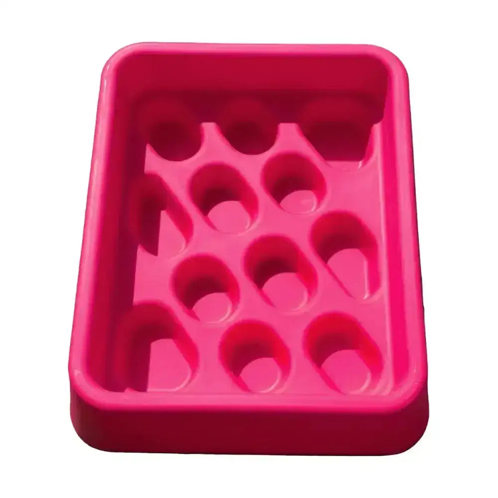 Bright pink rectangular silicone soap dish with circular indentations designed for parallax grad-dual feeder slow feeding trough